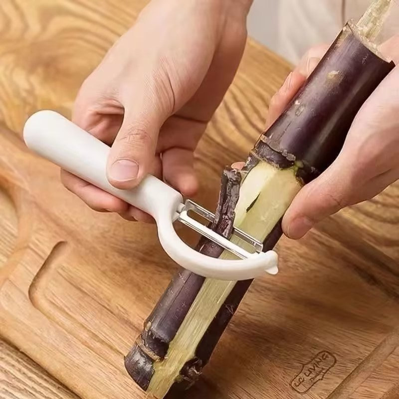 Multifunctional fruit and vegetable peeler for home use