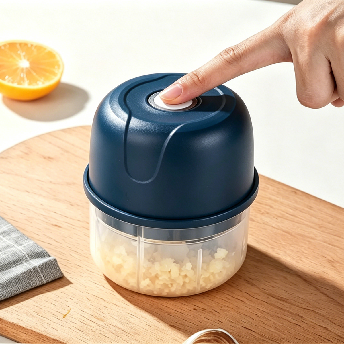 Electric garlic press