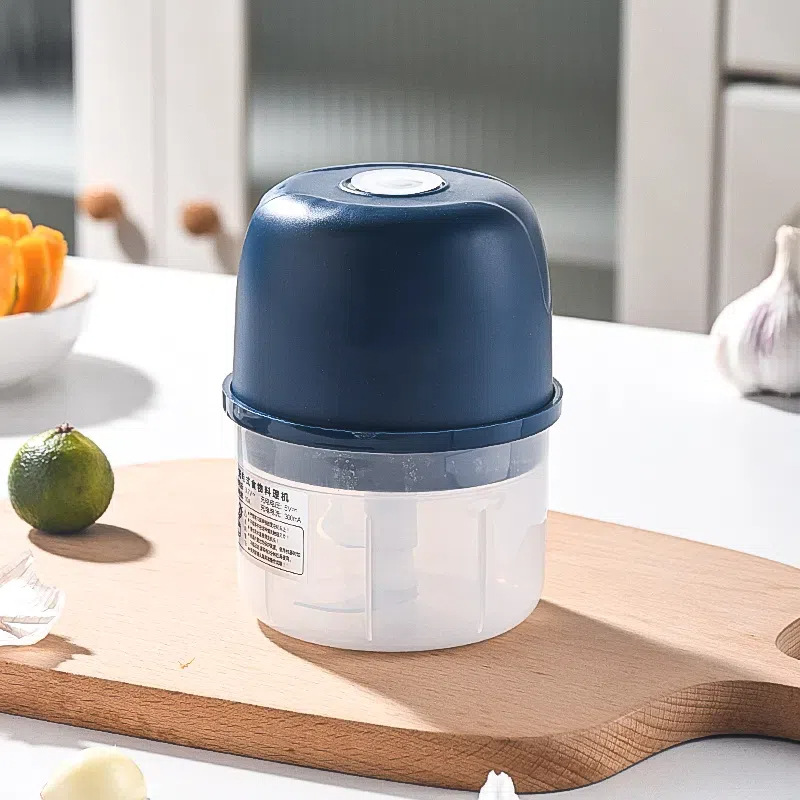 Electric garlic press